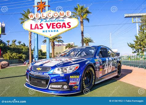 Welcome To Las Vegas Sign And Nascar Racing Car Editorial Photography