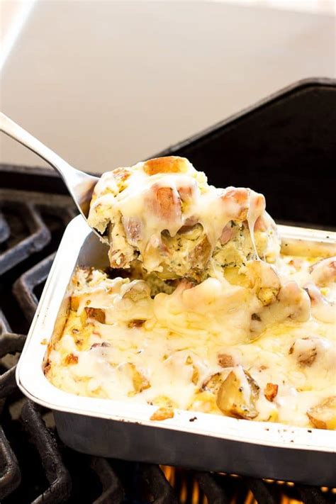 This comfort food features slices of potatoes, ham and cheese in a creamy sauce with a golden au gratin crust on top. No Dishes Grilled Breakfast Casserole - The Recipe Rebel