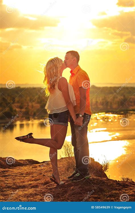Loving Couple Kissing Passionately At Sunset Stock Image Image Of