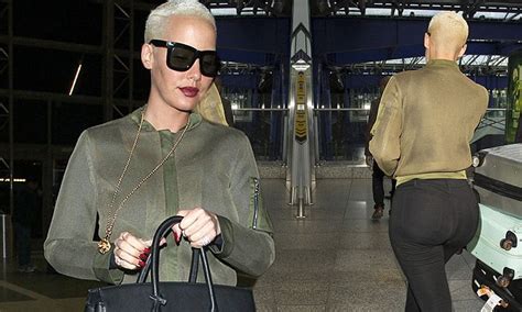 Amber Rose Shows Off Derriere In Skin Tight Jeans In London Daily Mail Online