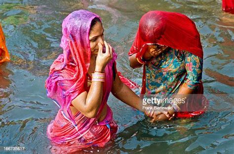 River Bathing Indian Women Photos And Premium High Res Pictures Getty