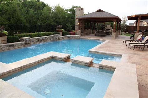 Designs of inground swimming pools. Clean lines on this square shaped spa blend nicely with ...