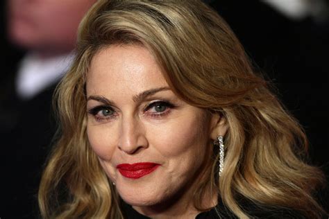 Referred to as the queen of pop. Madonna Donating to Detroit After 'Inspiring' Visit | Time