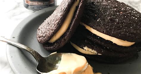 Divide the mousse between the two halves of the cake, then invert the top half over the bottom half (you're forming a tunnel for the filling here). chocolate stout whoopie pie with salted caramel filling