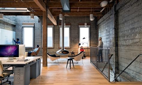 Eclectic Office Equipment Concrete And Wood Dominate The Interior