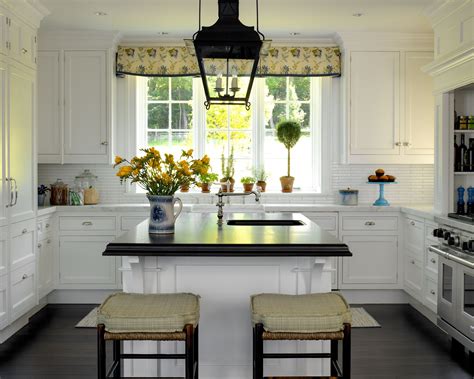 Colonial Style Kitchen With White Cabinetry And Blue And Yellow Accents