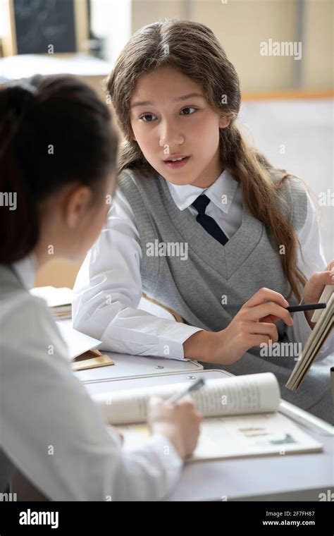 Two Students Talking Classroom Teenager Hi Res Stock Photography And
