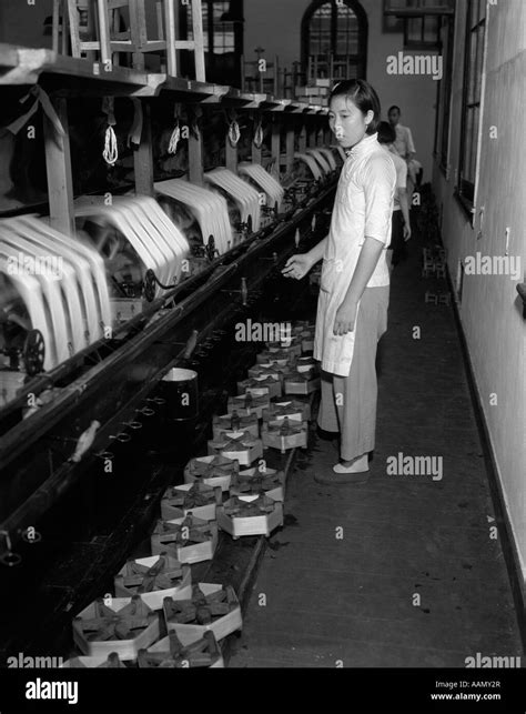 1920s 1930s Chinese Woman Silk Factory Worker At Winding Machines