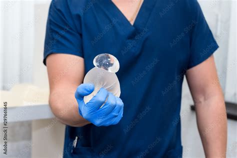Damaged Torn Gummy Bear Breast Implant In Surgeons Hands