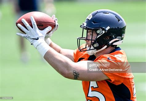 Nate Adkins Of The Denver Broncos Catches A Pass During Minicamp At