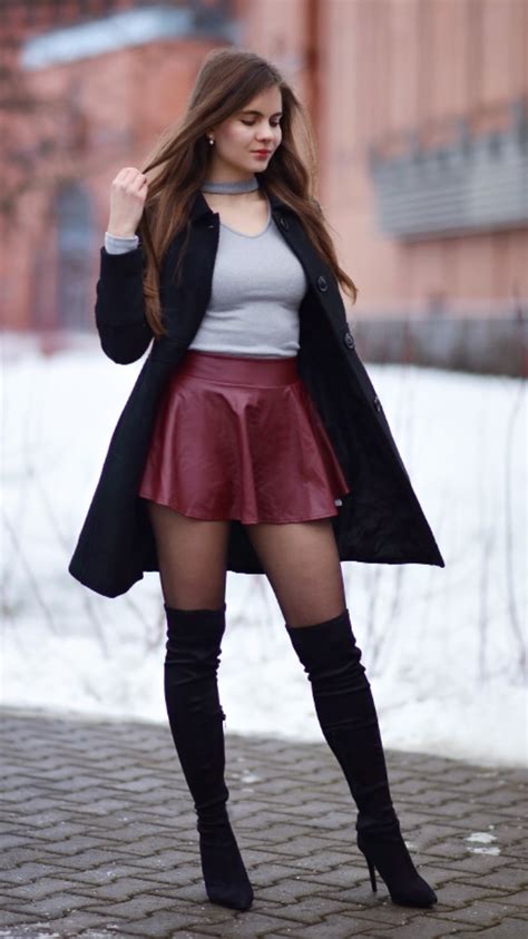 Elegant Black Coat Burgundy Leather Skirt And Suede Knee Boots As