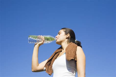 Woman Drinking Water After Exercise Stock Photo Image Of Holding