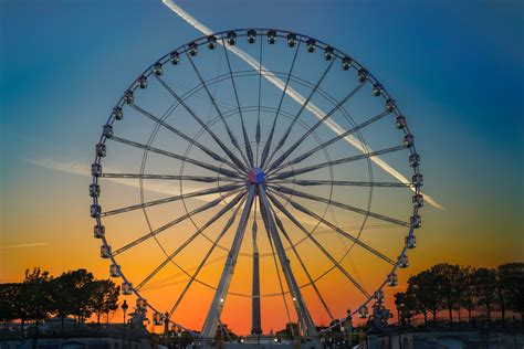 Ferris Wheel In Amusement Park At Sunset · Free Stock Photo