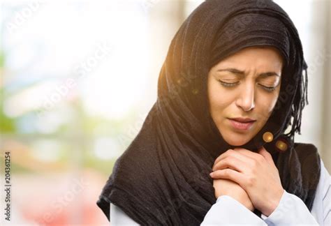 Young Arab Woman Wearing Hijab Crying Depressed Full Of Sadness