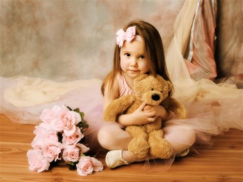Little Girl Hugging A Teddy Bear Mystery Wallpaper
