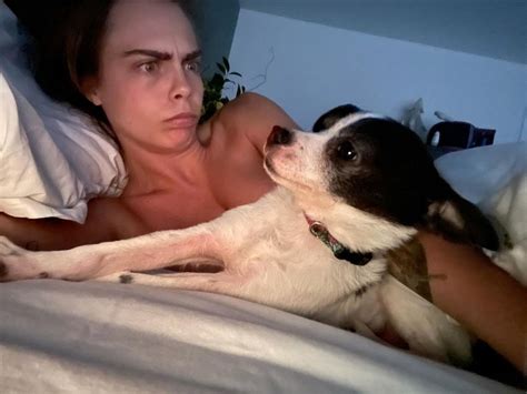 Cara Delevingne Nude Tits In Bed With Her Dog 4 Photos The Fappening