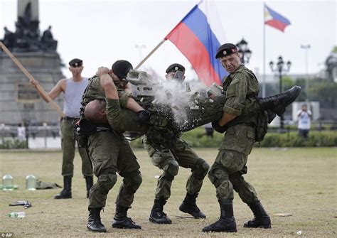 Russian Marines Hit Each Other With Burning Wood During Skills Display In Manila Daily Mail