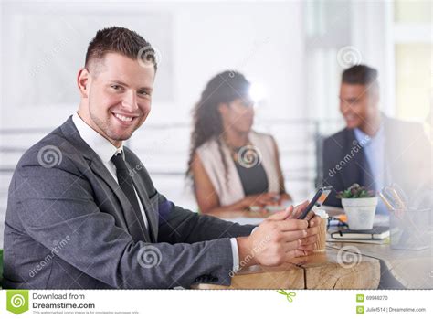 Team Of Successful Business People Having A Meeting In Executive Sunlit Office Stock Photo ...