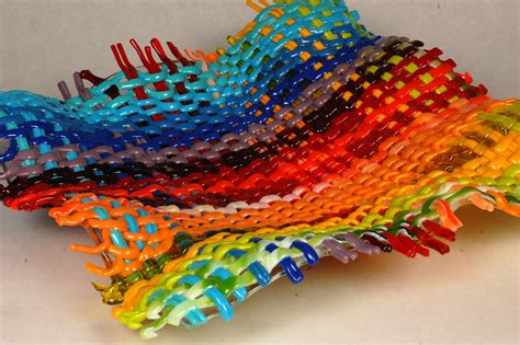 with bright striking colors across the entire spectrum this woven glass piece by artists aaron