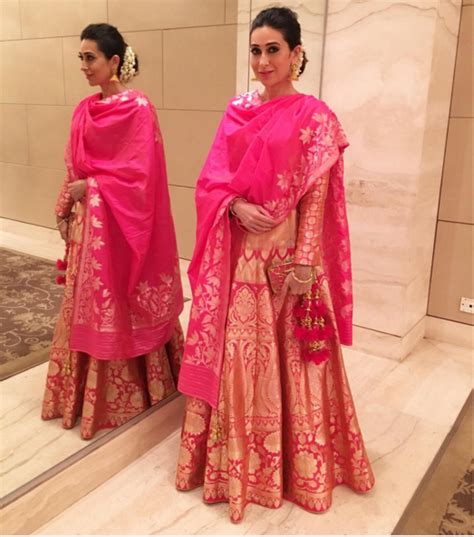 Karishma Kapoor In A Rani Pink Silk Lehenga By Neerua Clothing Bollywood Celebrity Fashion
