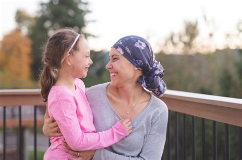 Mother With Cancer Hugging Daughter Westlake Village Biopartners