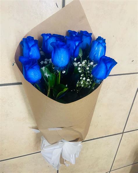 One Dozen Blue Roses By Rubis Flower Shop