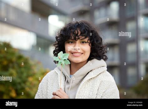 Portrait Of Teenage Girl Holding Pinwheel Stock Photo Alamy