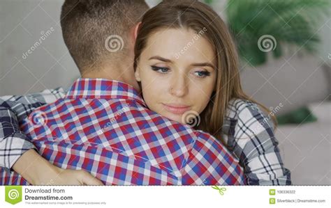 Closeup Of Young Upset Couple Embrace Each Other After Quarrel Woman