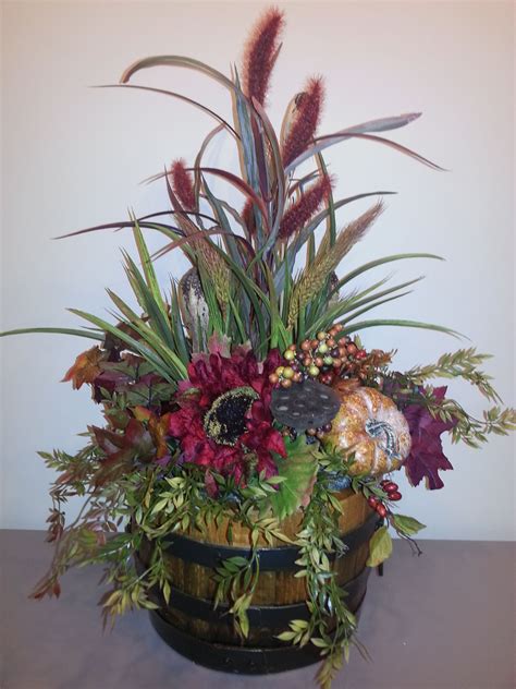 Fall Arrangement In Antique Barrel Designed By Carol Fall Centerpiece