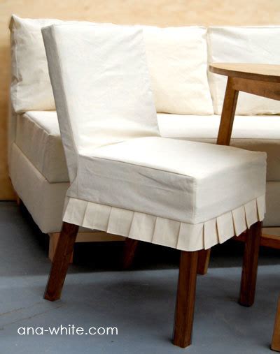 I turned a beautiful printed tablecloth into a custom dining room chair slipcover to makover bare henriksdal chairs from ikea. Ana White | Drop Cloth Parson Chair Slipcovers - DIY Projects