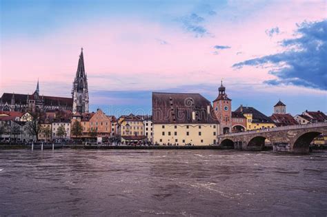 Old Medieval Stone Bridge And Historic Old Town In Regensburg Germany