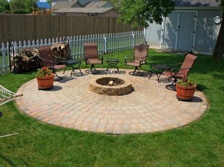 To build a backyard fire pit with bricks, start by digging a circular hole that's 4 feet in diameter and 12 inches deep. Build your own outdoor Fire Pit and Patio by ennairam | Backyard fire, Fire pit patio, Fire pit ...