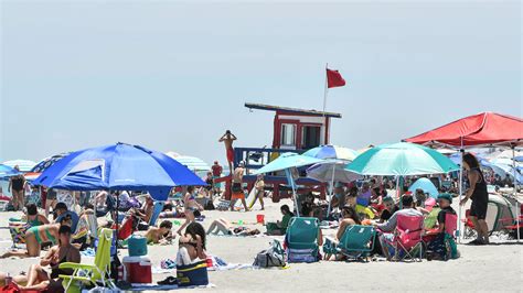 Coronavirus Reopenings Cocoa Beach Florida Cracks Down On Litter