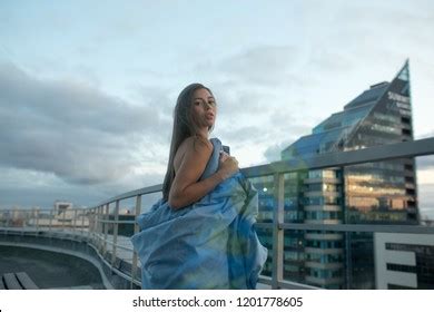 Naked Girl Wrapped Blanket Stands On Stock Photo 1201778605 Shutterstock