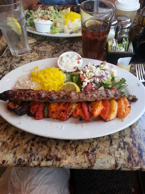Panini kabob grill serves a variety of salads; Chicken and Beef kabobs with Greek salad. - Yelp