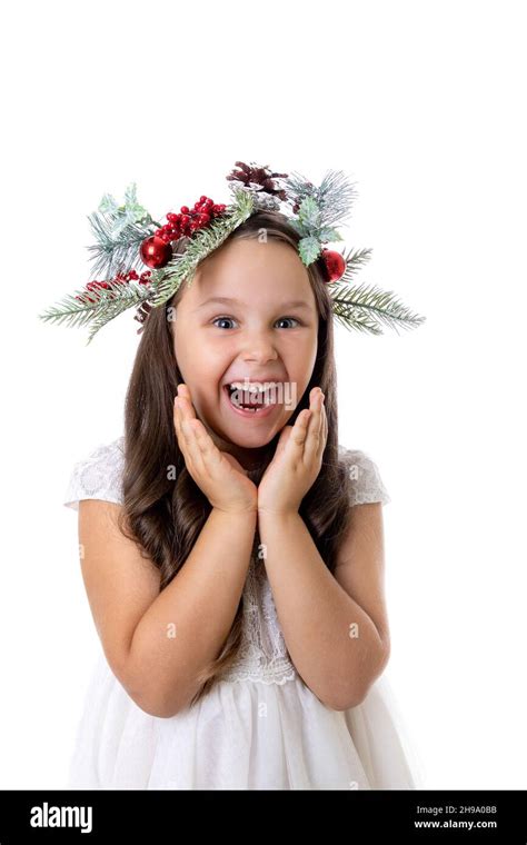 Portrait Of Cute Charming Girl With Open Mouth In Christmas Wreath