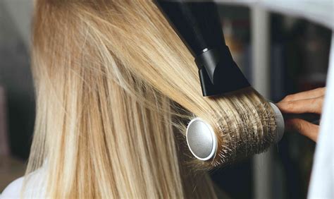 How To Blow Dry Your Hair Straight In A Matter Of Minutes