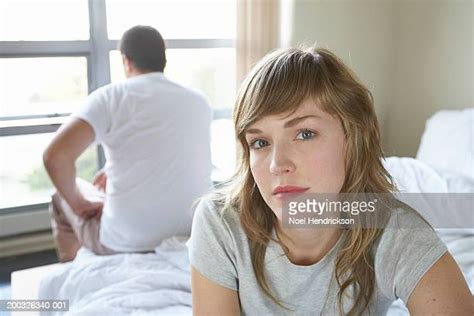 Woman And Man In Bed Facing Camera Sitting Up Photos And Premium High