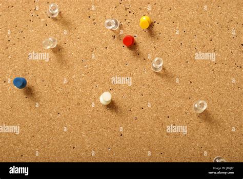 Various Pins Stuck Into A Corkboard For Office Use Stock Photo Alamy