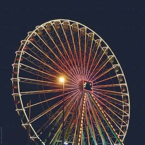 Ferris Wheel At Night By Stocksy Contributor Marcel Stocksy