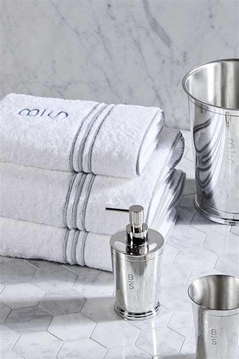 Our dash faucet and towel hook, watt sconces and gotham towel look dashing in a dc bath by… Personalized Bath Towels, Textiles & Accessories ...