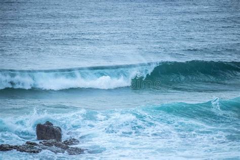 Waves Crashing Into Rocks Stock Photo Image Of Blue 134976430