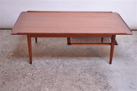 Terp coffee table from the artifort design stable and available from msl interiors, a unique designer coffee table suited to any contemporary environment. Danish Modern Selig Teak Coffee Table with Rattan Rack For ...
