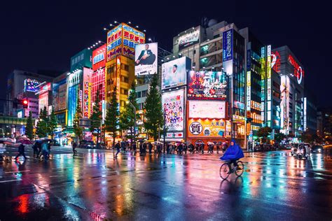Neon Lights And Billboard Advertisements On Buildings At Akihabara At
