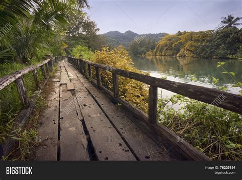 Old Wooden Bridge Over Small River Stock Photo And Stock Images Bigstock