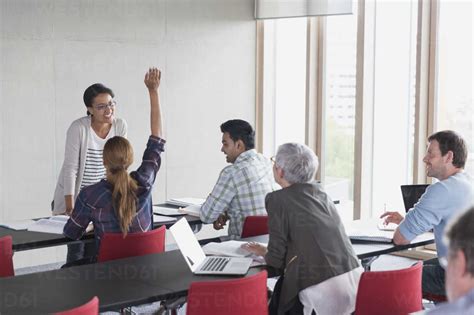 Teacher And Students In Adult Education Classroom Stock Photo