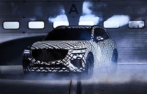 Genesis Reveals Camouflaged Gv70 Previewing New Dynamic Midsize Suv