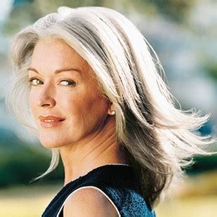 One of the best long hairstyles for older women with round faces is one that keeps the bangs tossed on one side and provides excellent feature framing. Long And Wispy Layered Hairstyle For Mature Women With ...