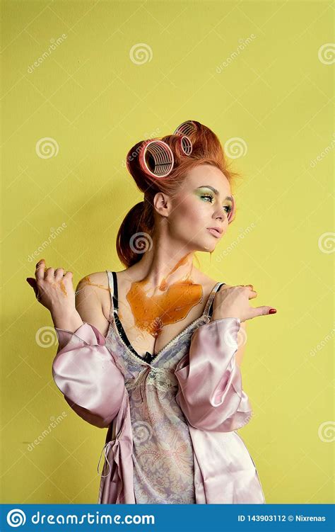 Young Redhead Woman With Shugaring Paste On Her Hands Face Body And