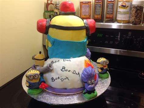 Minions are everywhere and everything about them is just so adorable. Full back view of Minion cake | Minion cake, Decor, Design